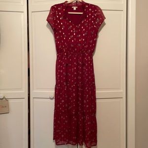 Dress with cap sleeves with tassel ties at neck